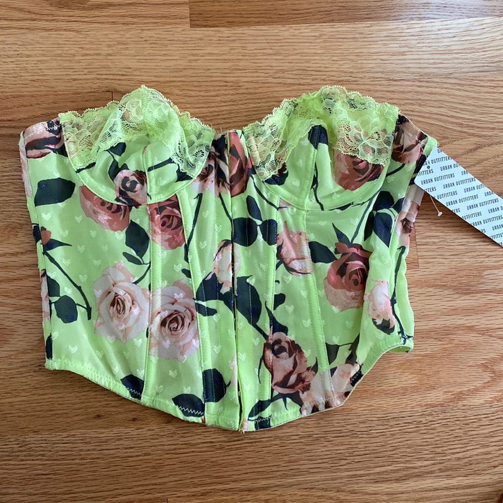 This is a size S rose patterned corset from Urban Outfitters.